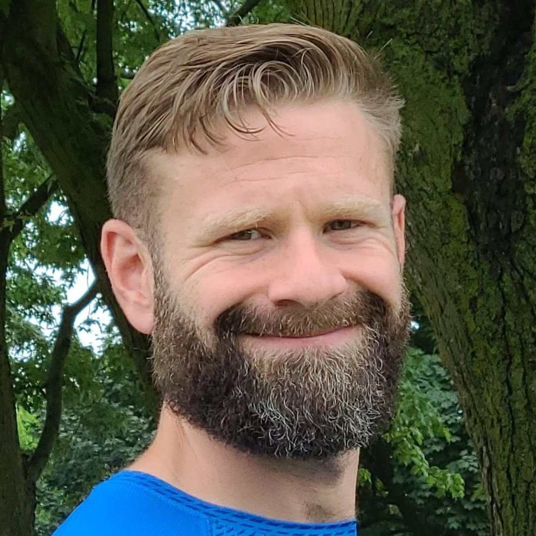 A photograph of Tim Bartley
